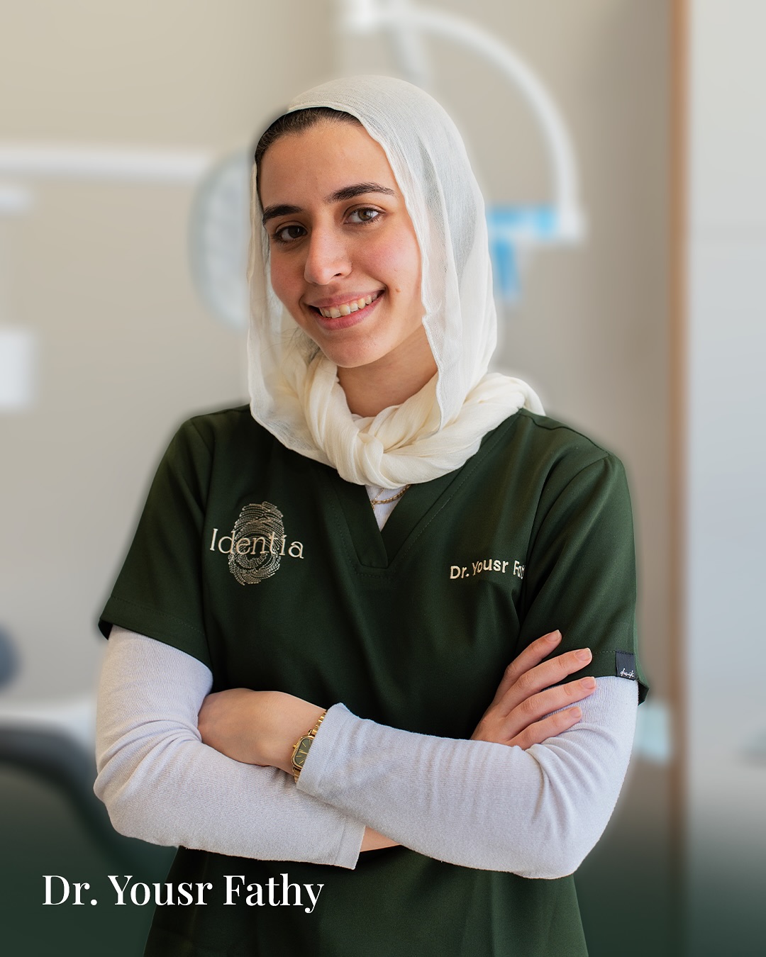 Portrait of Dr. Yousr Mohamed Fathy in green Identia scrubs.