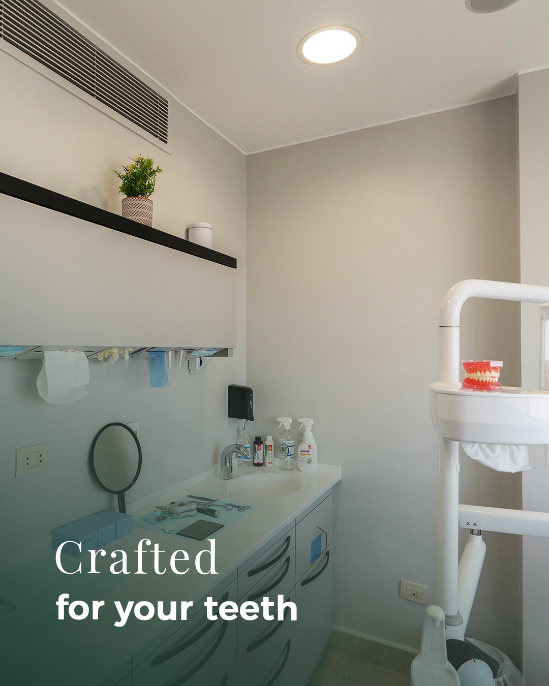 Sterilization prep room with cabinetry and a phantom-head training unit.